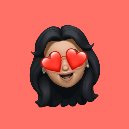 Memoji wanita berkacamata berbentuk hati dengan latar merah